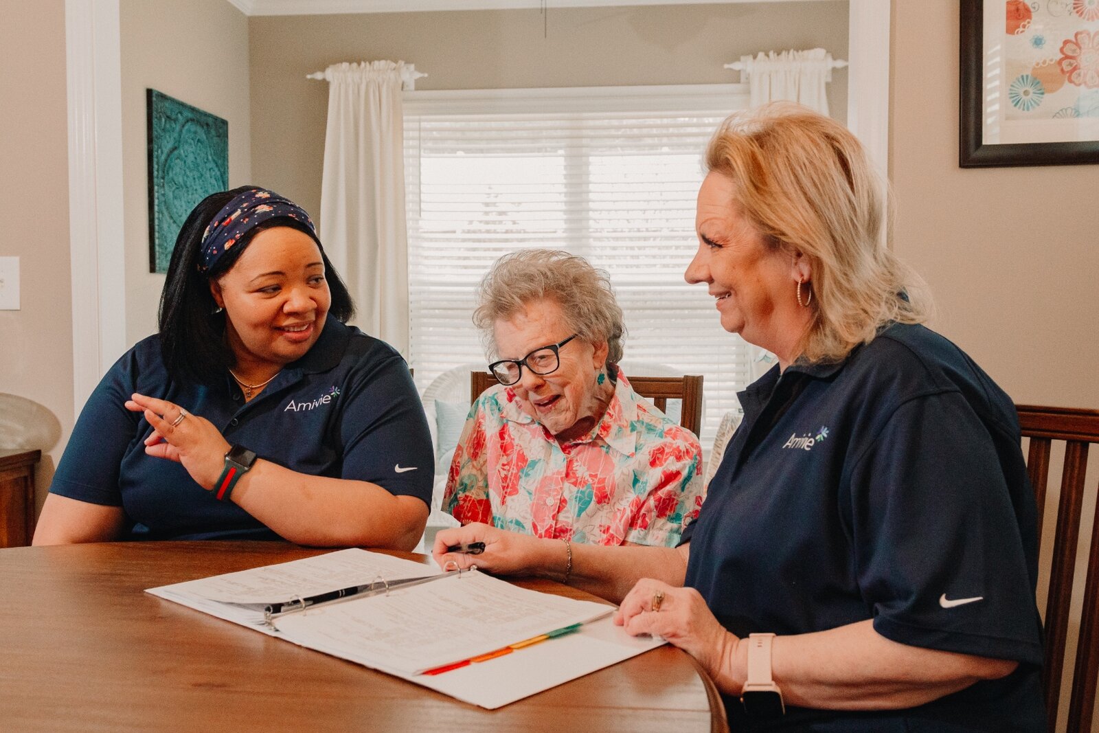 Amivie caregivers providing in-home support to a client with developmental disabilities